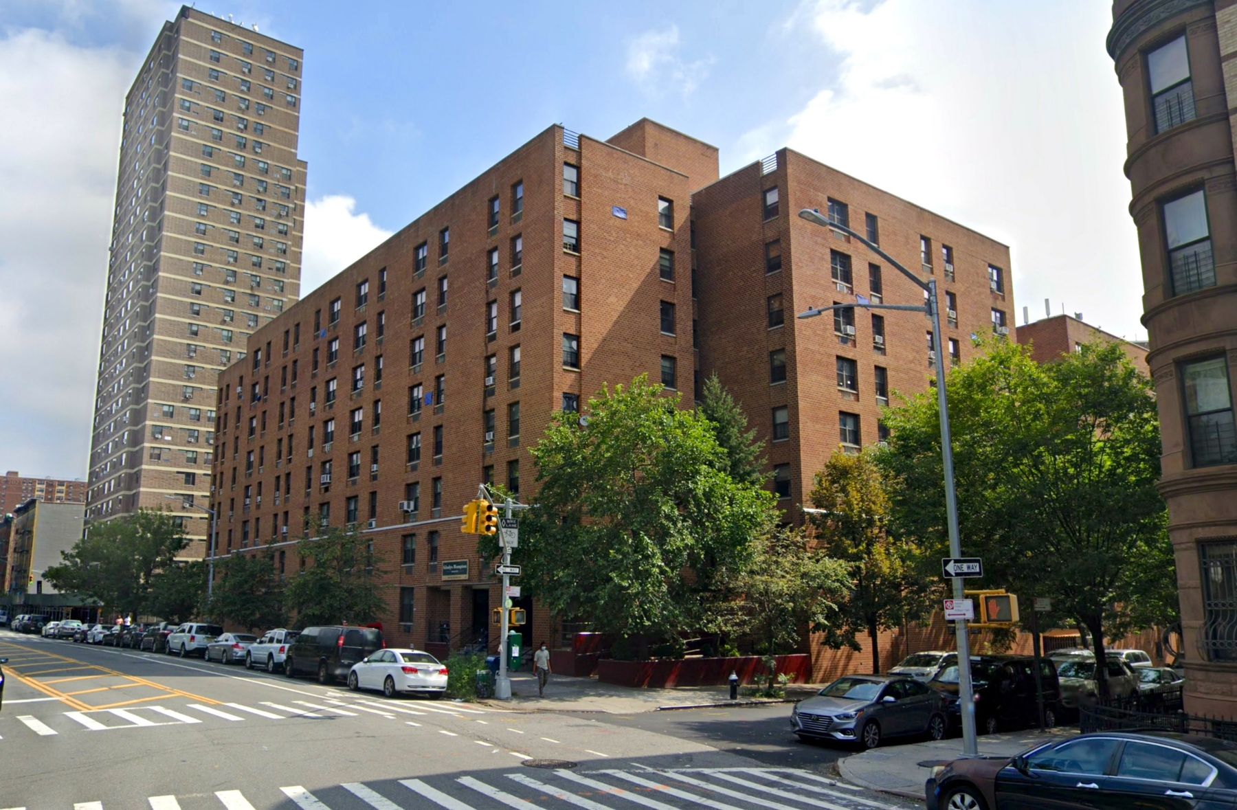 Gladys Hampton brick apartment towers on St. Nicholas Avenue